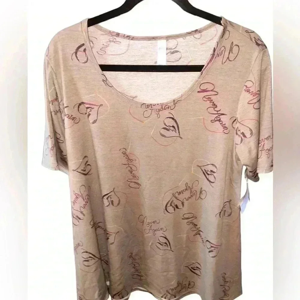 Lularoe tan perfect T-shirt . Heartbreak shirt. “Never Again” in purple ink